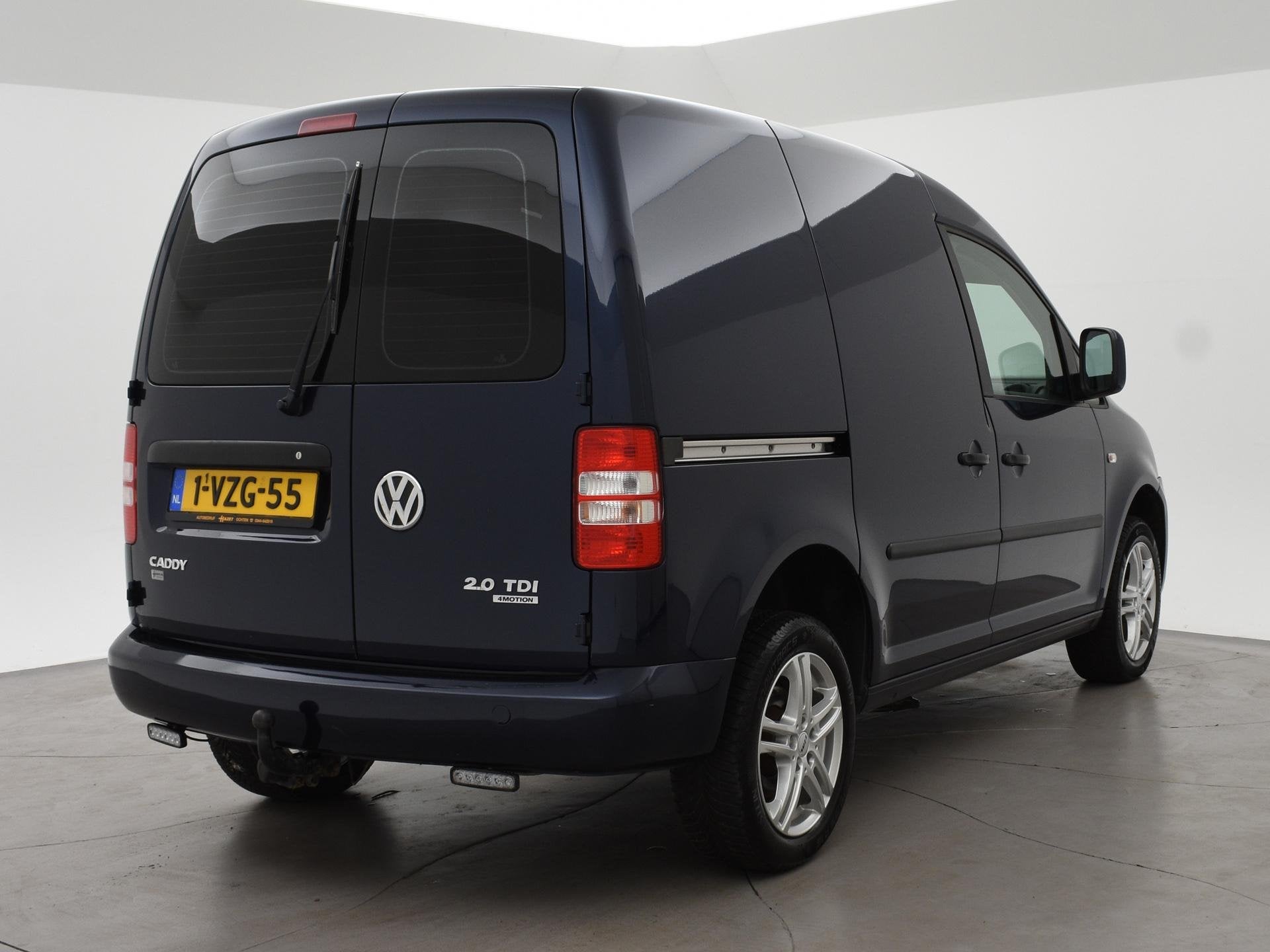 Volkswagen Caddy 2.0 TDI 110 PK 4MOTION + TREKHAAK 1500 KG |, Auto's, Stof, Gebruikt, Zwart, 4 cilinders