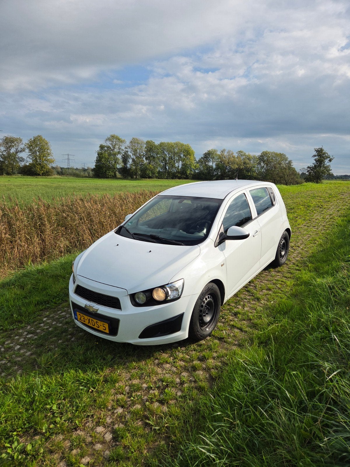 Chevrolet Aveo 1.3D 5-DEURS 2012 Wit, Auto's, Euro 5, Wit, Origineel Nederlands, Particulier