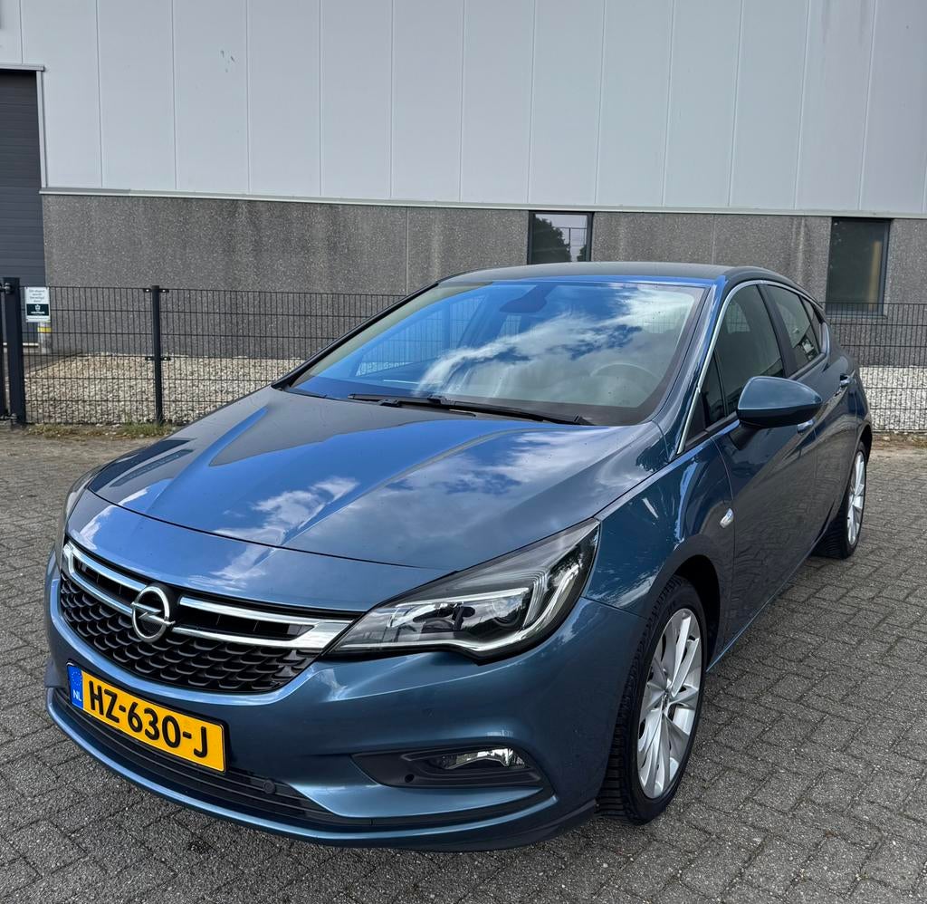 Opel Astra 1.0 Turbo | Park. Sens V/A | Multimedia | NAP!, Auto's, Blauw, 610 kg, 23 km/l, Origineel Nederlands