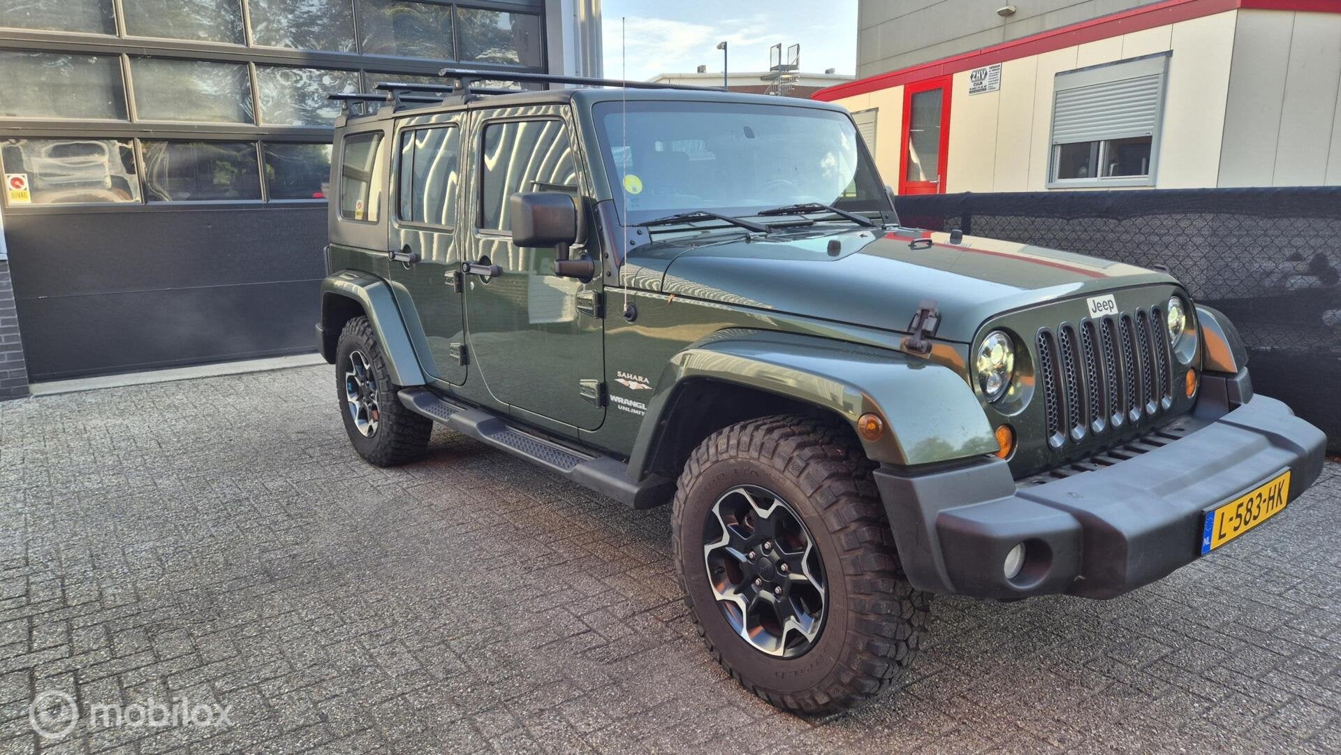 Jeep Wrangler Unlimited 3.8 Sahara, Auto's, Jeep, Stof, Gebruikt, 120 €/maand, Bedrijf