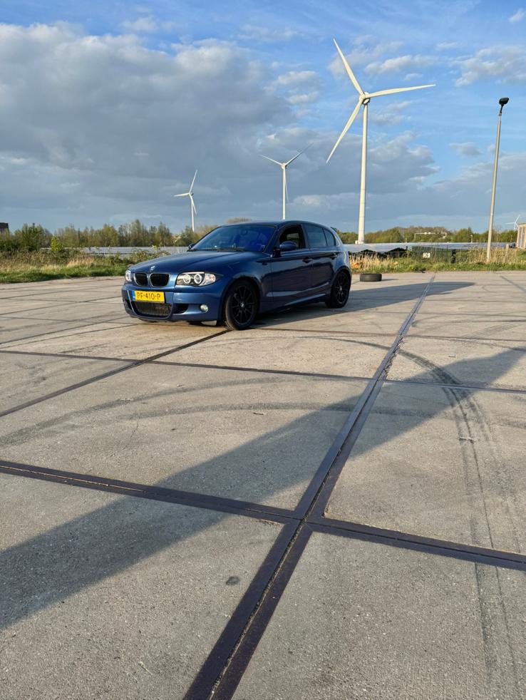 BMW 1-Serie 1.6 116I 2005 Blauw M pakket, carplay, angel eye, Auto's, BMW, 1596 cc, Achterwielaandrijving, Zwart, 4 cilinders