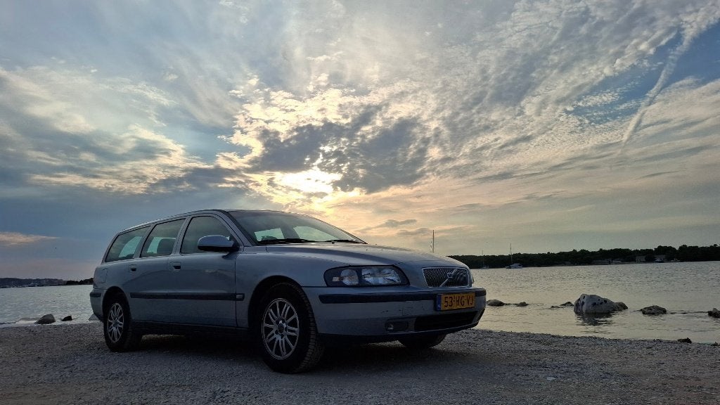 Volvo V70 2.4 140PK 2001 Grijs, Auto's, Volvo, Voorwielaandrijving, Stof, 1800 kg, Zwart