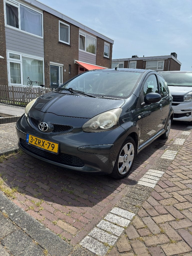 Toyota Aygo 1.0 12V Vvt-i 5DRS 2008 Grijs, Auto's, Toyota, Voorwielaandrijving, Stof, 68 pk, Handgeschakeld