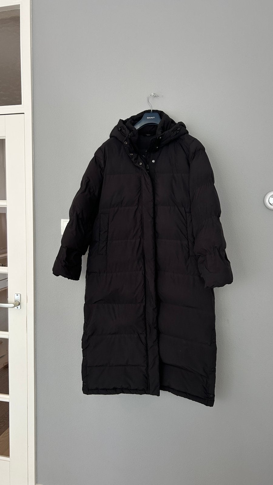 C&A lange zwarte winterjas / puffer jas met capuchon maat 40, Ophalen, Zo goed als nieuw, Maat 38/40 (M), Zwart
