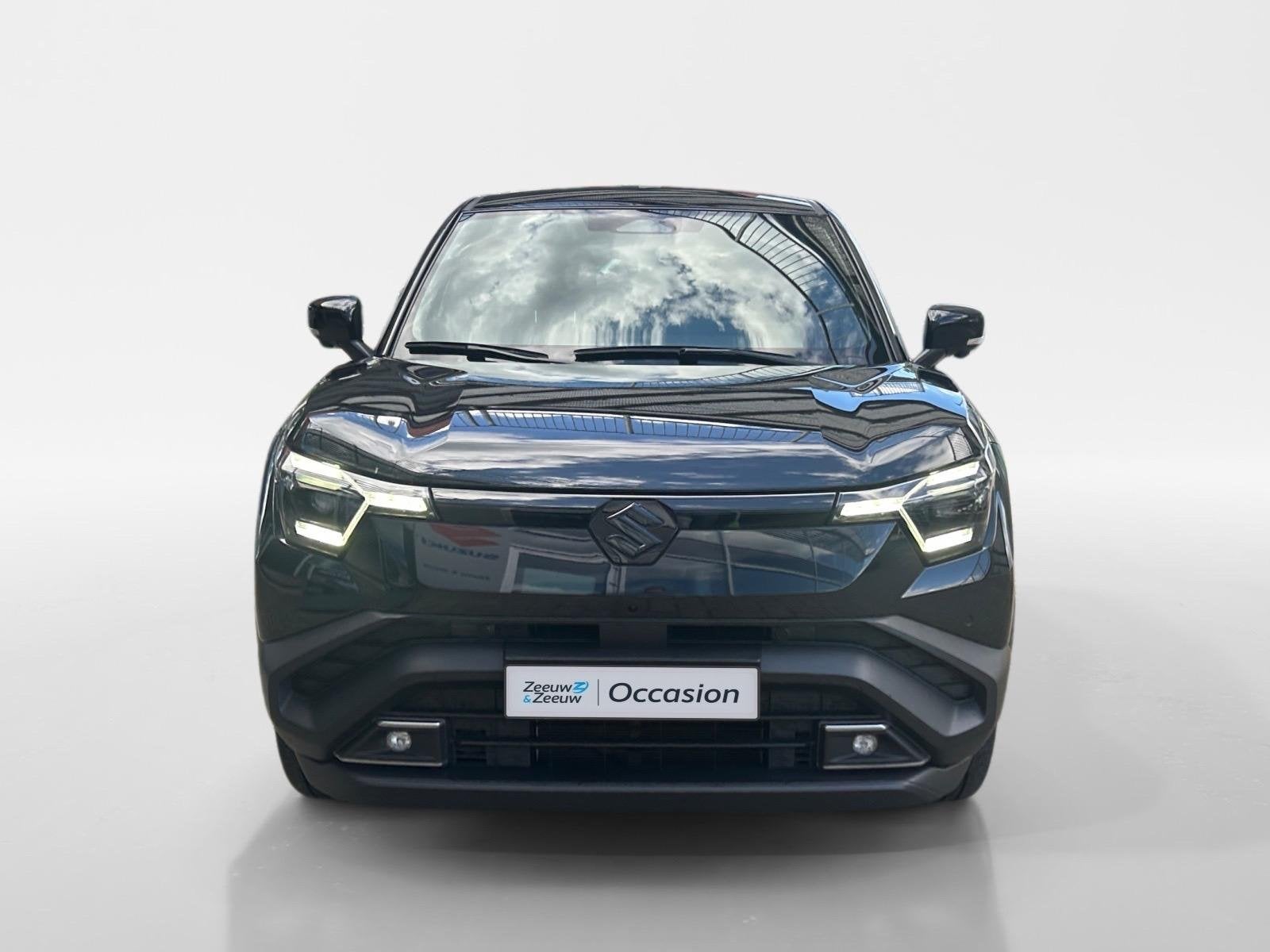 Suzuki e VITARA Style 61 kWh | Apple Carplay/Android Auto |, Auto's, 12 maanden, Verwarmde buitenspiegels, Leder en Stof, Zwart