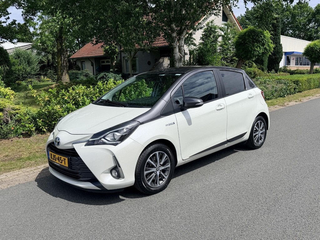 Toyota Yaris 1.5 Hybrid 100PK Y20 Automaat•Camera, Gebruikt, Euro 6, 4 cilinders, Wit