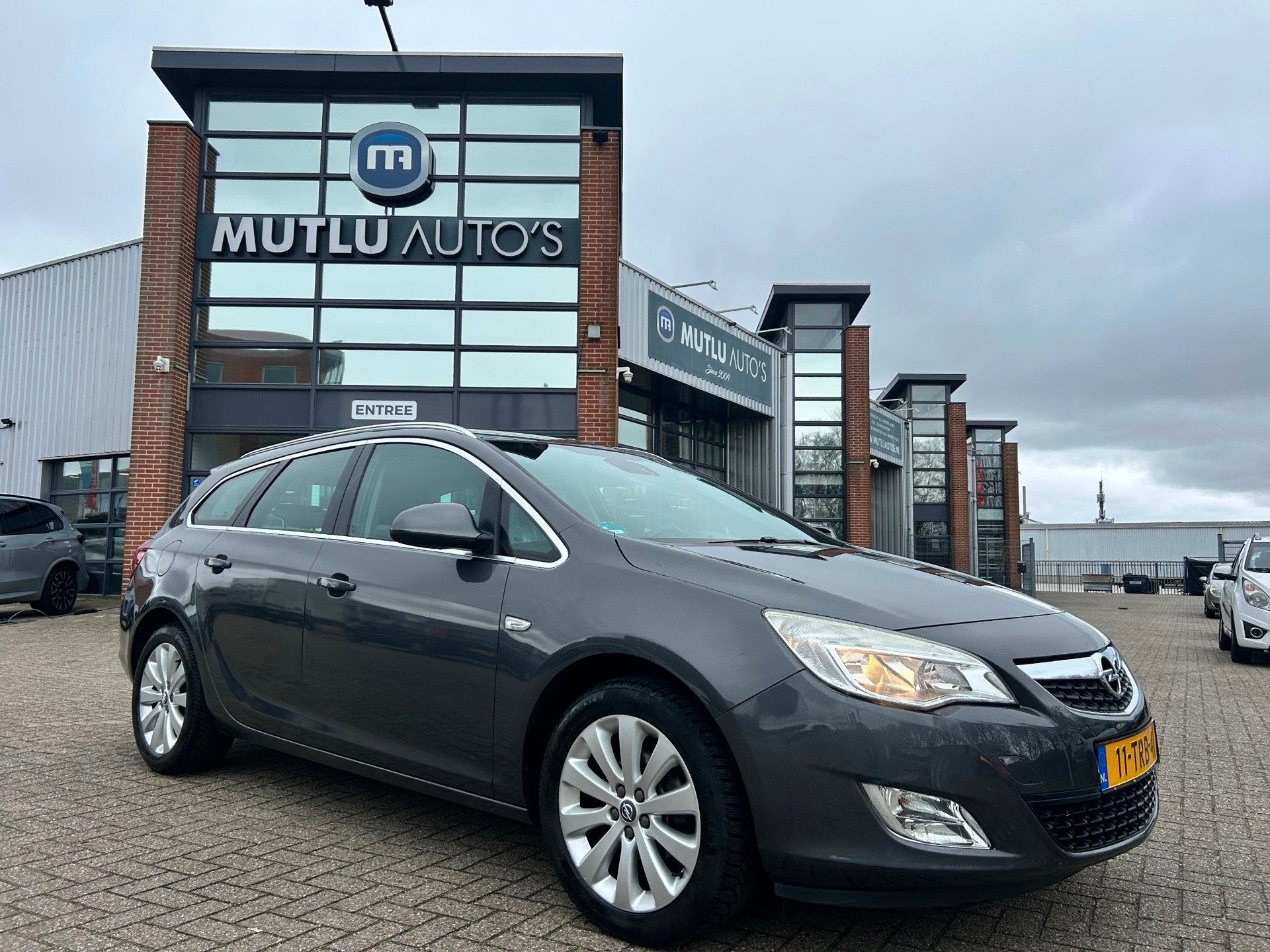 Opel Astra Sports Tourer 1.4 Turbo Cosmo Airco NAP PDC NAVI, Voorwielaandrijving, Euro 5, Gebruikt, 4 cilinders