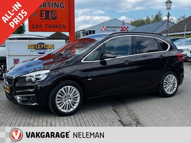 BMW 2-Serie Active Tour. 218i tourer luxury-line 136pk Autom, Auto's, 12 maanden, 136 pk, Gebruikt, Leder