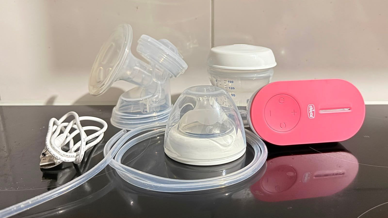 Chicco elektrische borstkolf met fles en accessoires, Kinderen en Baby's, Babyvoeding en Toebehoren, Gebruikt, Borstkolf, Ophalen of Verzenden