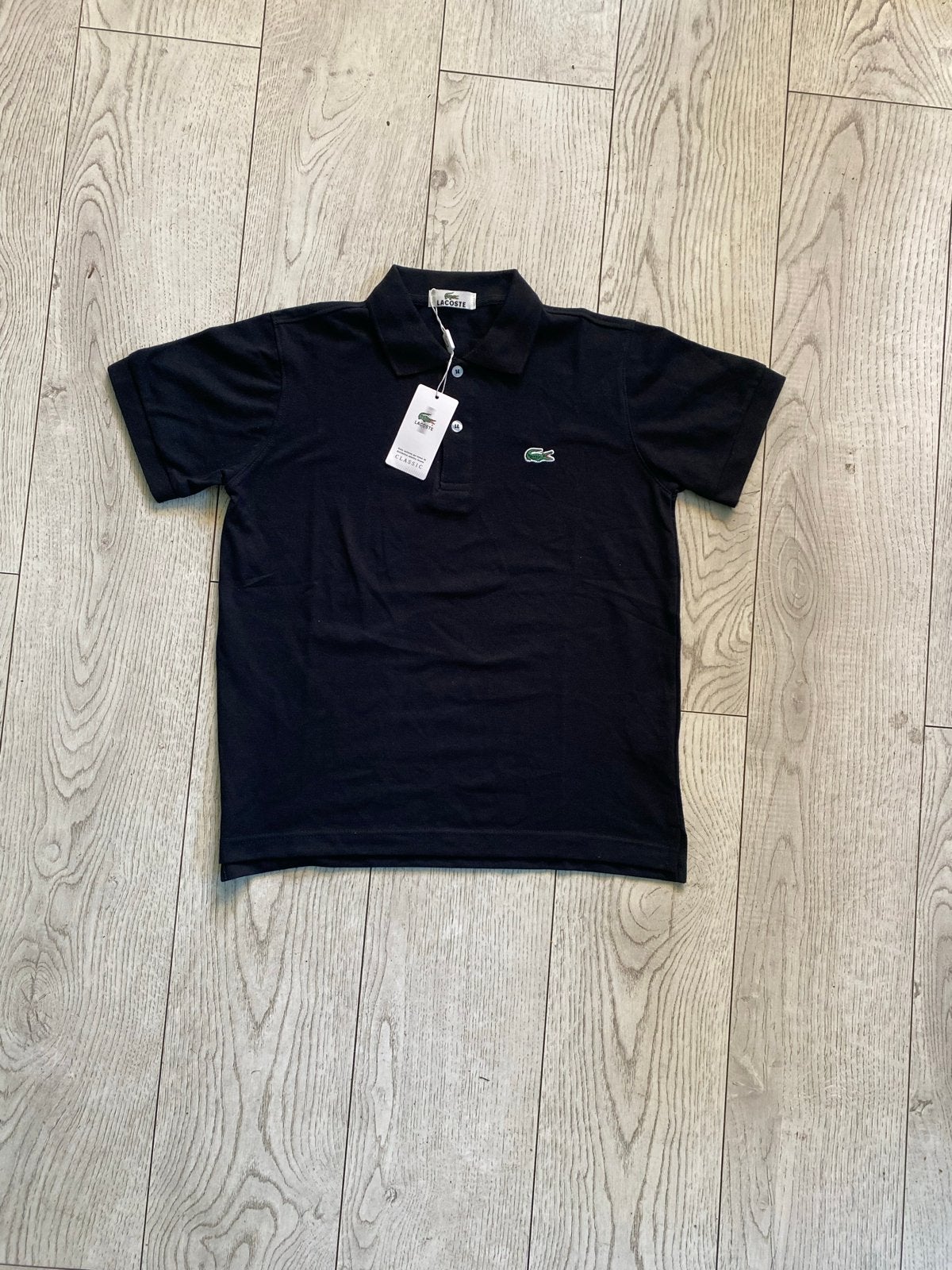 Nieuwe Lacoste Polo, Ophalen of Verzenden, Nieuw, Maat 46 (S) of kleiner, Zwart