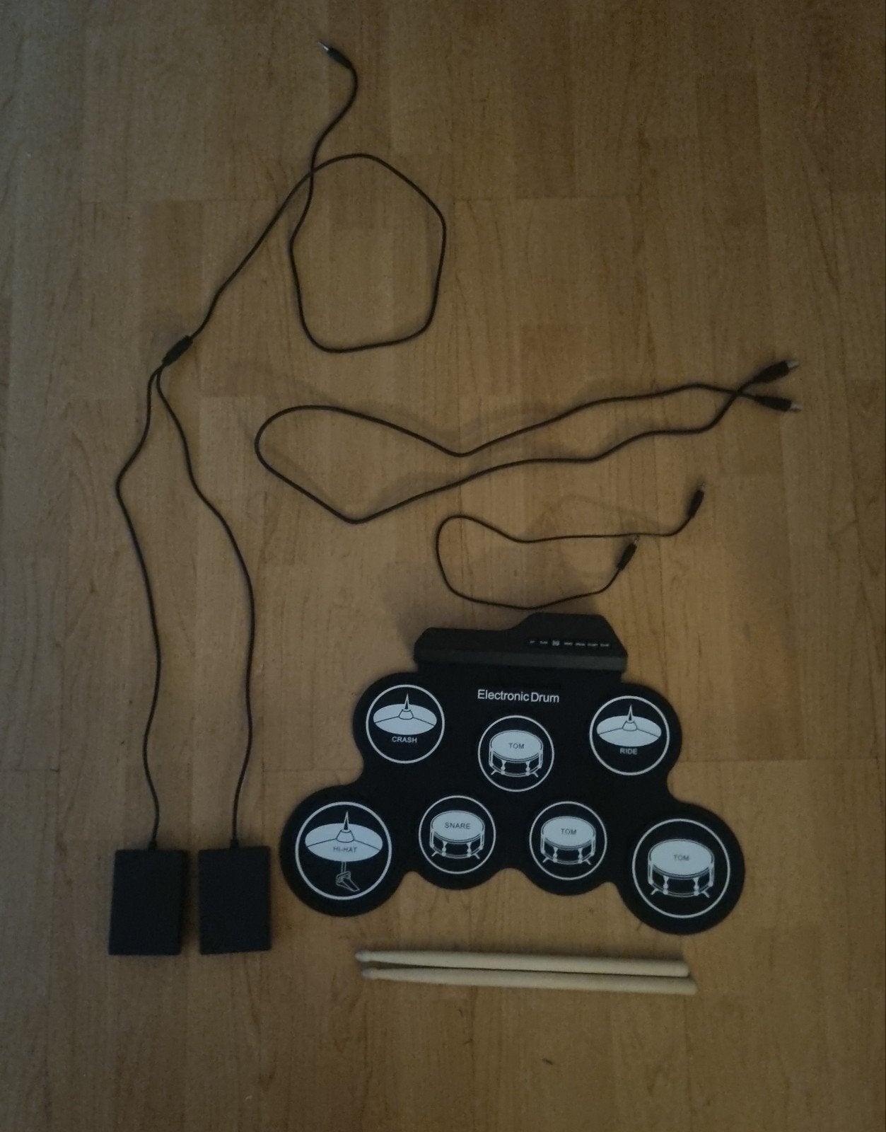 Compact elektronisch drumstel met drumstokken, Ophalen