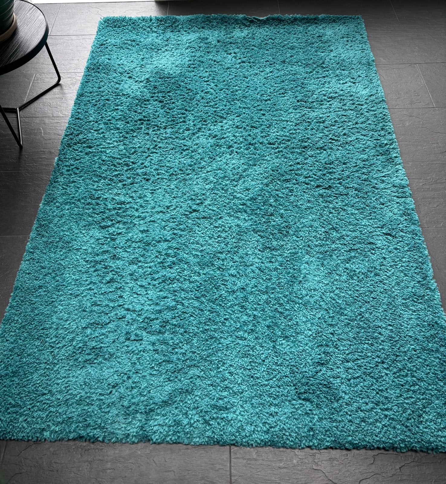 Turquoise hoogpolig vloerkleed 135 x 190cm zo goed als nieuw, Ophalen, 100 tot 150 cm, Zo goed als nieuw, 150 tot 200 cm
