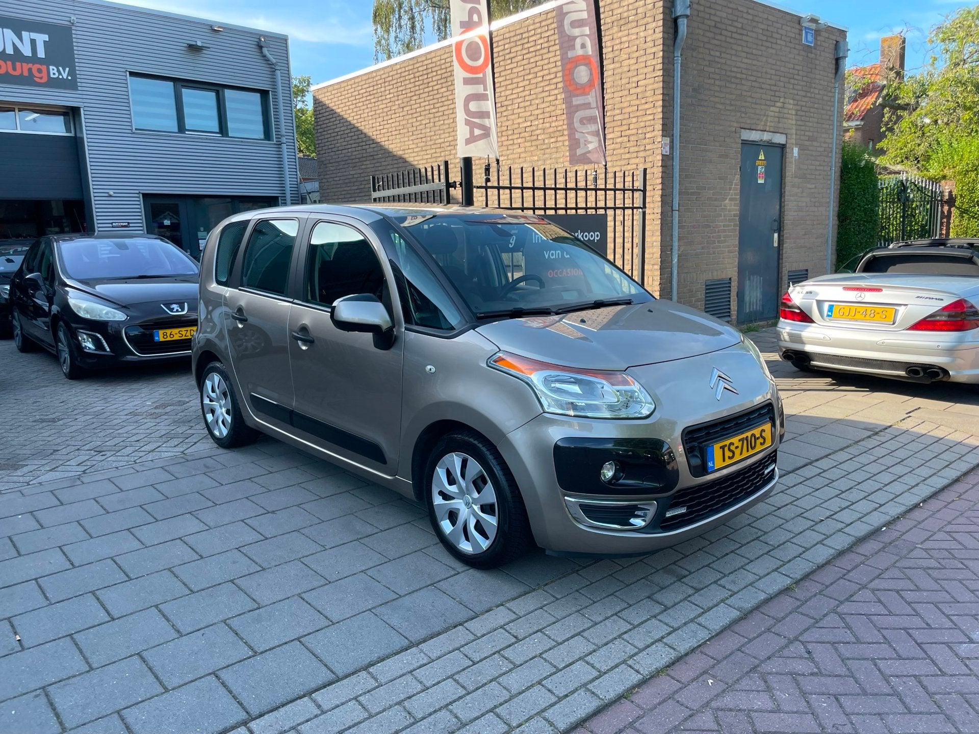 Citroen C3 Picasso 1.4 VTi Exclusive Airco Navi PDC NAP APK, Auto's, Voorwielaandrijving, 15 km/l, Gebruikt, Bruin