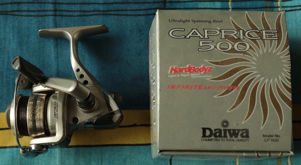 Ultralichte werpmolen, Daiwa Caprice 500, Ophalen of Verzenden, Gebruikt, Molen