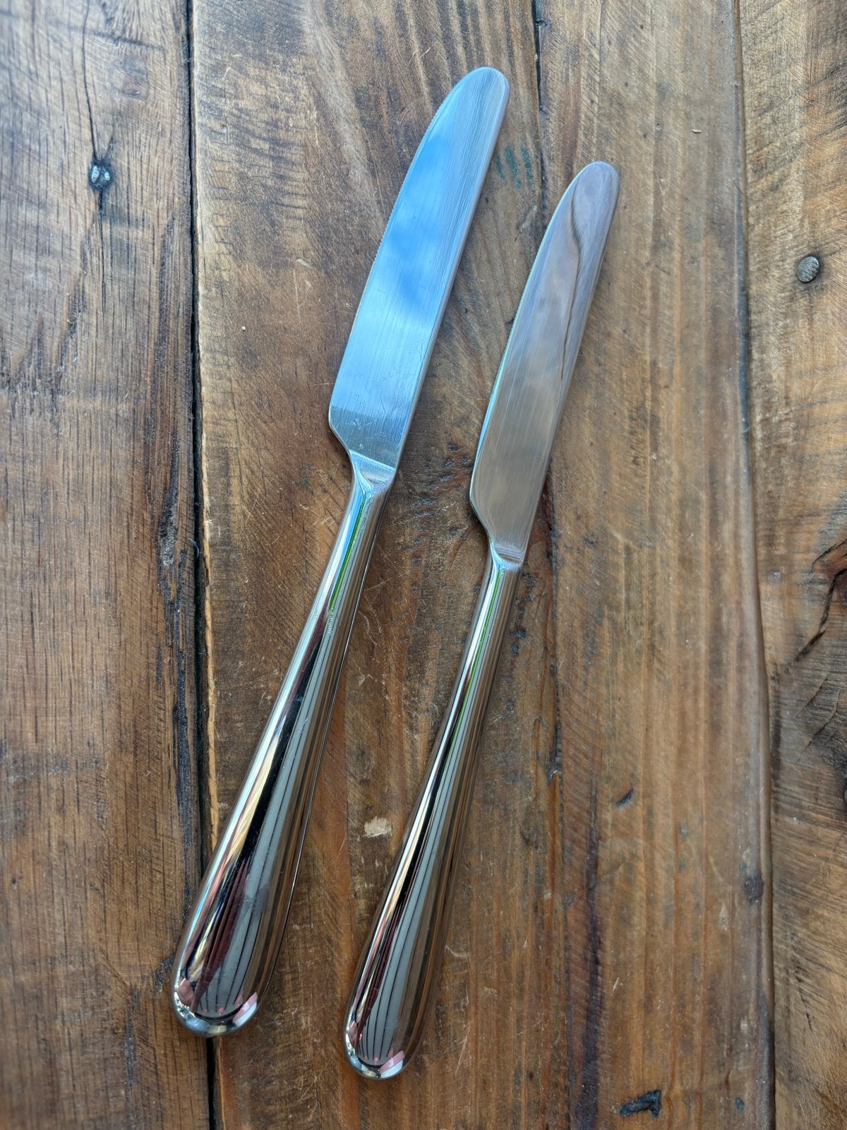 Alessi Eetmessen - Set van 2 - RVS dinermes, Huis en Inrichting, Keuken | Bestek, Gebruikt, Alessi, Los bestek, Ophalen of Verzenden