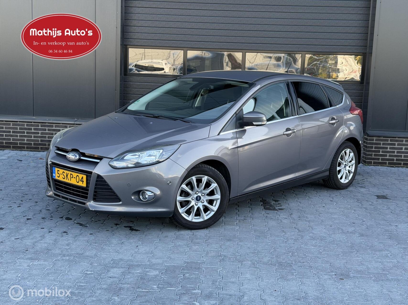 Ford Focus 1.6 TDCI Titanium Clima PDC Navi, Euro 5, 4 cilinders, Bruin, Origineel Nederlands