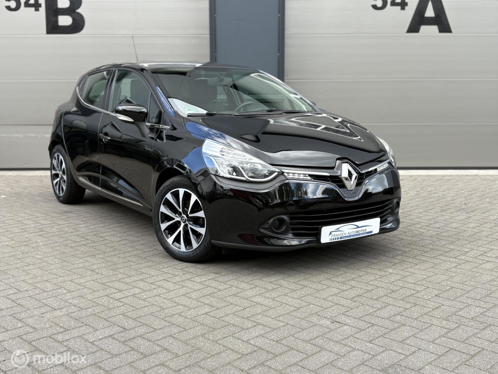 Renault Clio 1.2 zwart 16V Zeer nette auto Airco/cruise, Voorwielaandrijving, Euro 5, Stof, Gebruikt