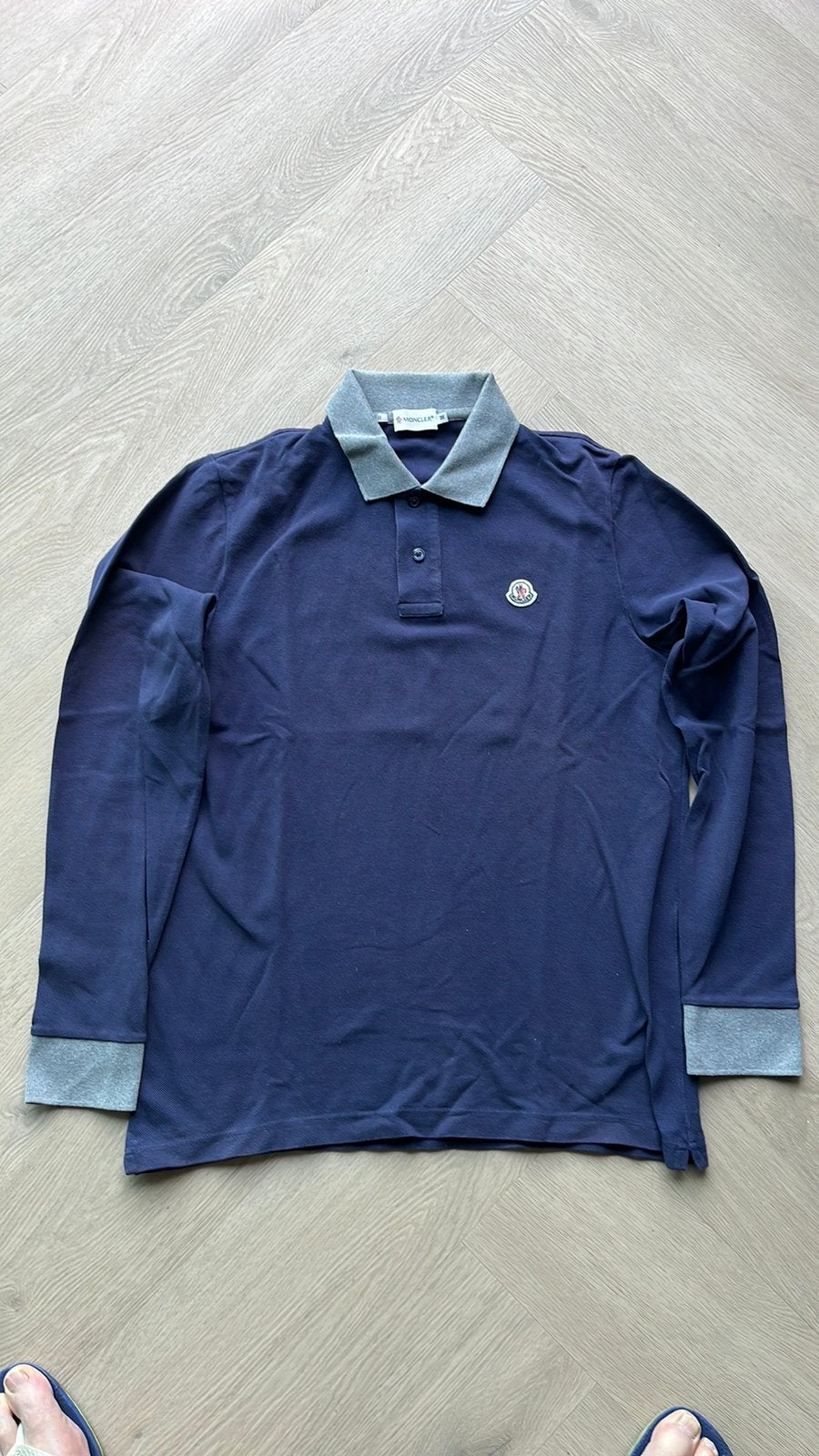 Moncler polo blauw met lange mouwen. Maat M. Origineel, Ophalen of Verzenden, Zo goed als nieuw, Maat 48/50 (M), Blauw