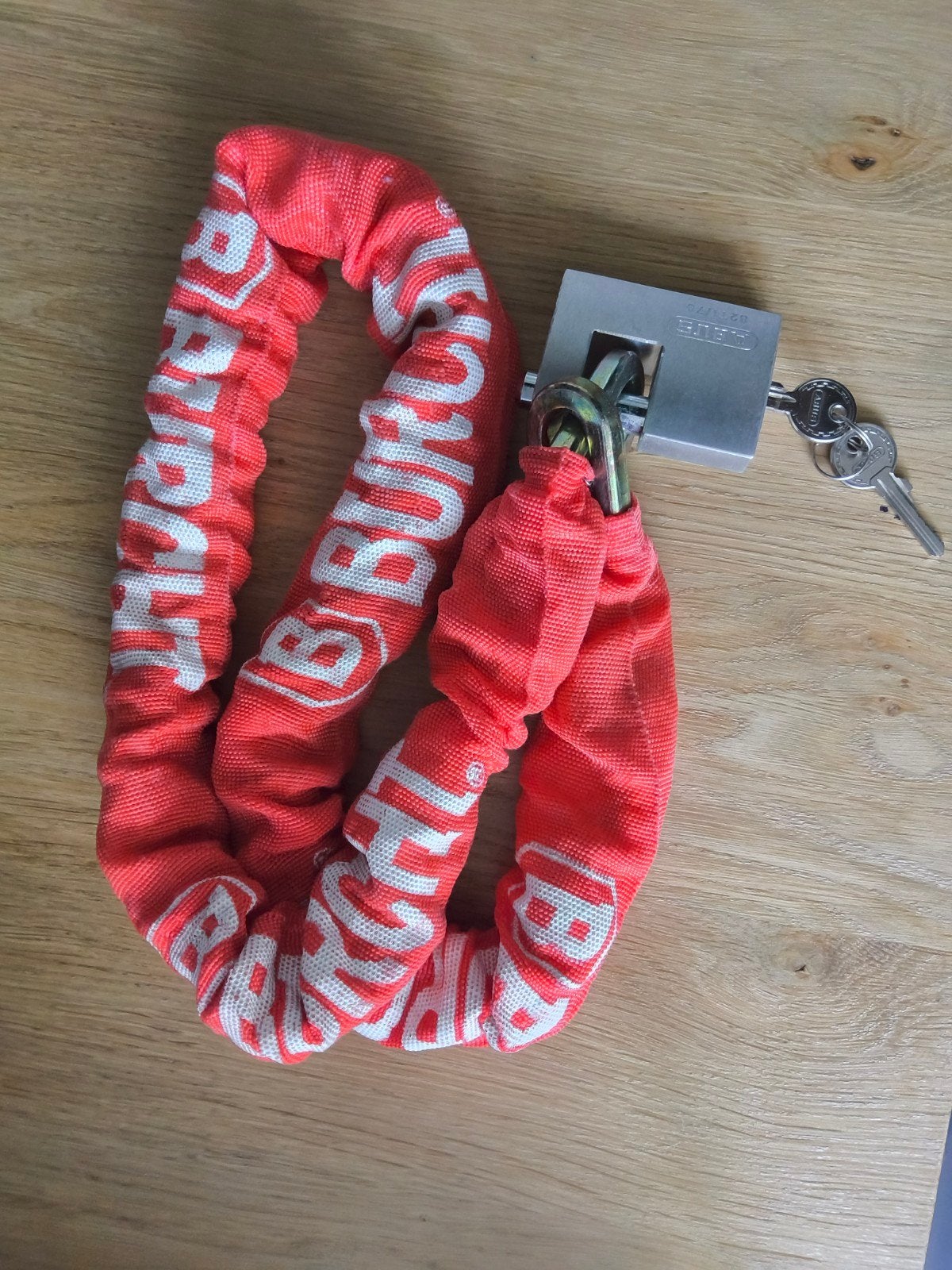 ABUS Kettingslot met Hangslot - Oranje, Ophalen of Verzenden, Zo goed als nieuw