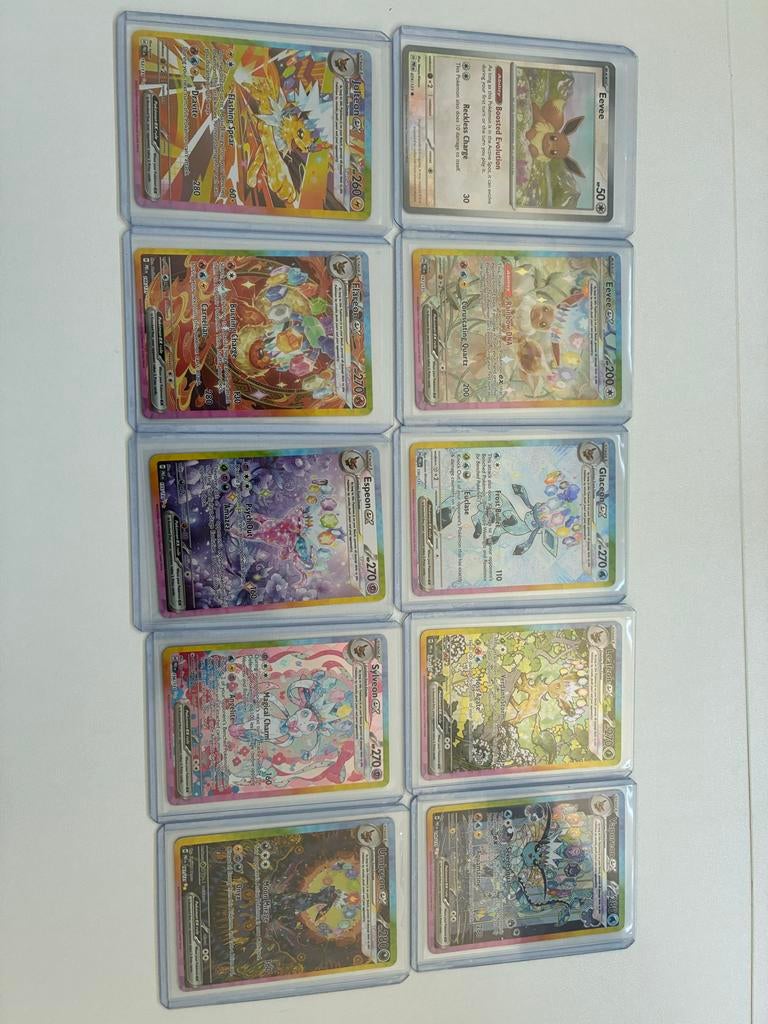 Prismatic God Pack! Verse pull Eeveelutions, Hobby en Vrije tijd, Ophalen of Verzenden, Zo goed als nieuw, Meerdere kaarten, Foil