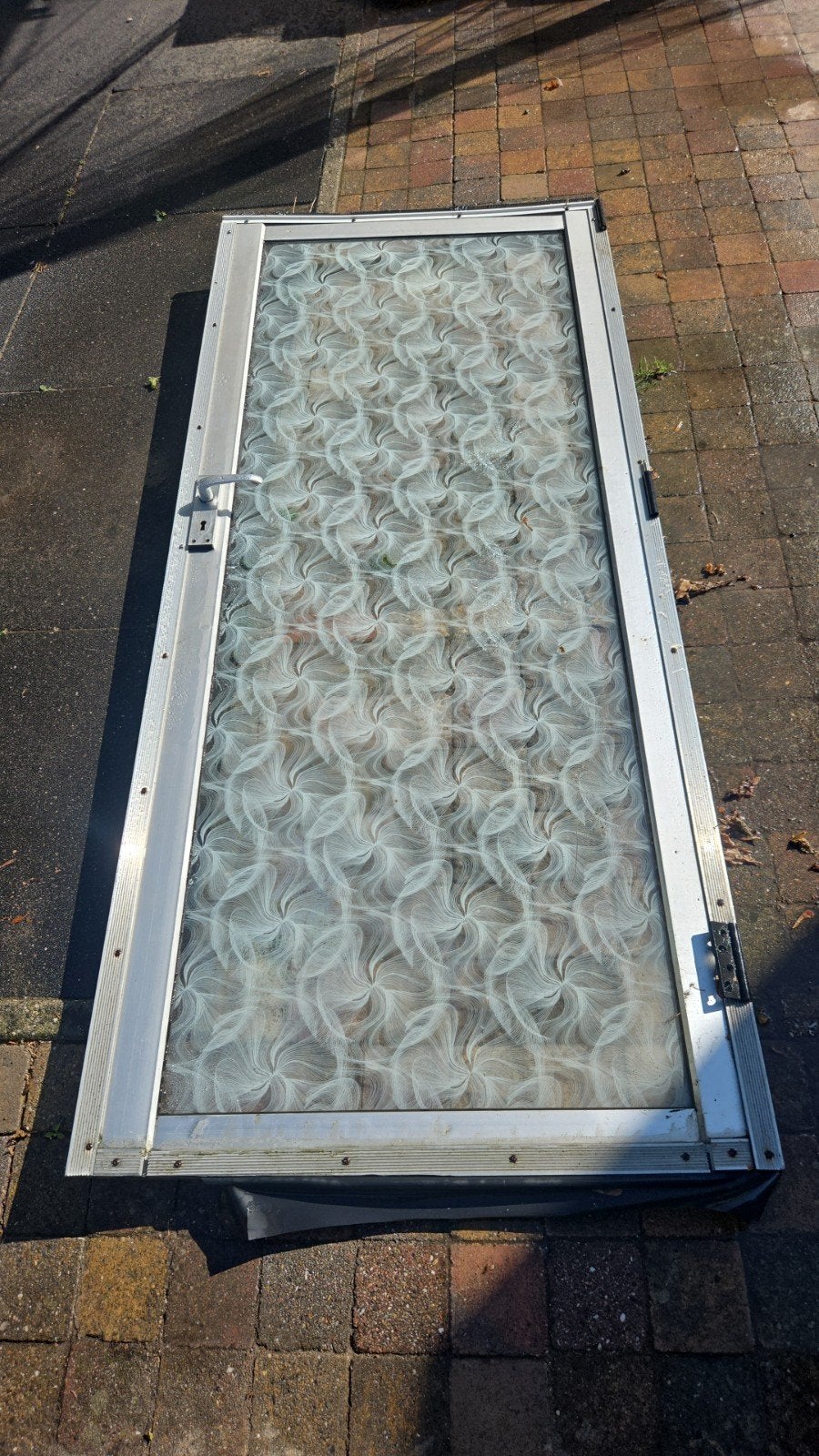Aluminium Deur, Ophalen