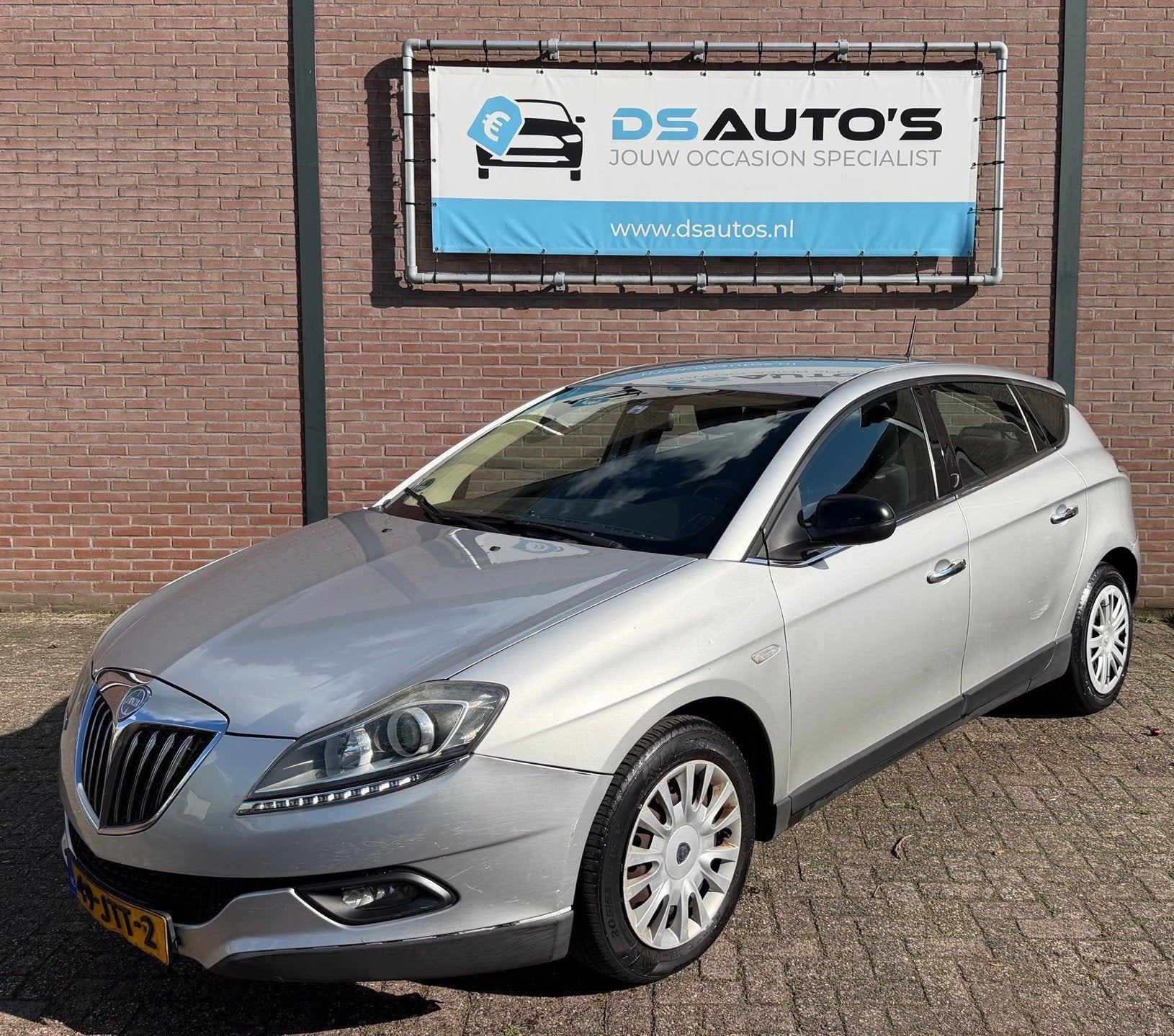 Lancia Delta 1.4-16V Argento, Auto's, Voorwielaandrijving, Gebruikt, 4 cilinders, Origineel Nederlands