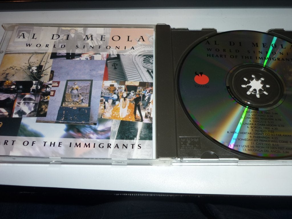 Al Di Meola world sinfonia de cd heart of the immigrants, Cd's en Dvd's, Cd's | Jazz en Blues, Verzenden, Zo goed als nieuw, Jazz