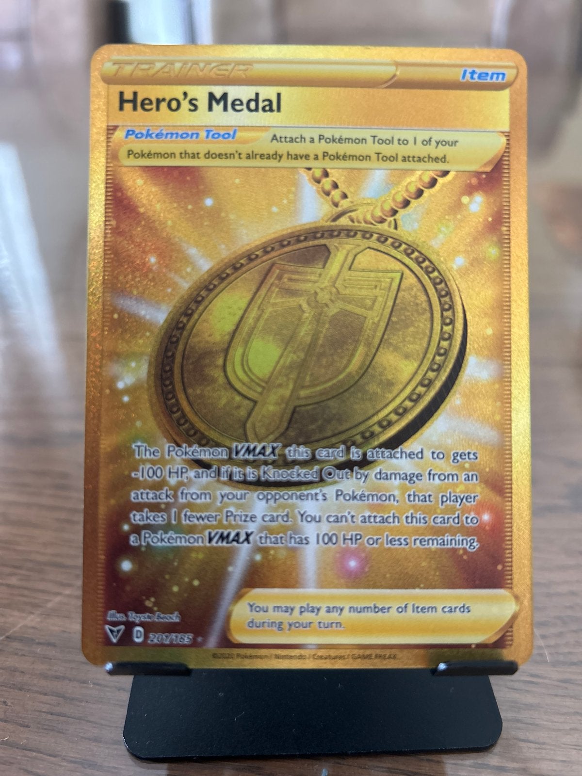 Pokémon Hero's Medal Gold Trainer Kaart - Zeldzaam Foil, Ophalen of Verzenden, Zo goed als nieuw, Losse kaart, Foil