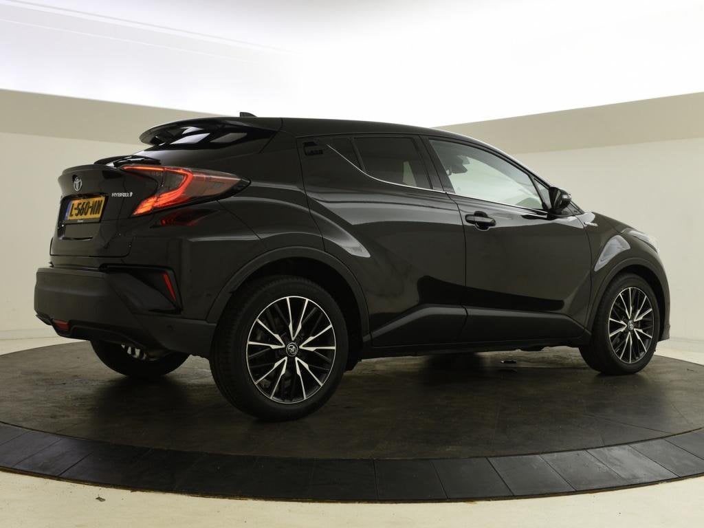 Toyota C-HR 1.8 Hybrid Executive | Halfleer | PDC | Blindspo, Euro 6, 4 cilinders, Leder en Stof, 26 km/l