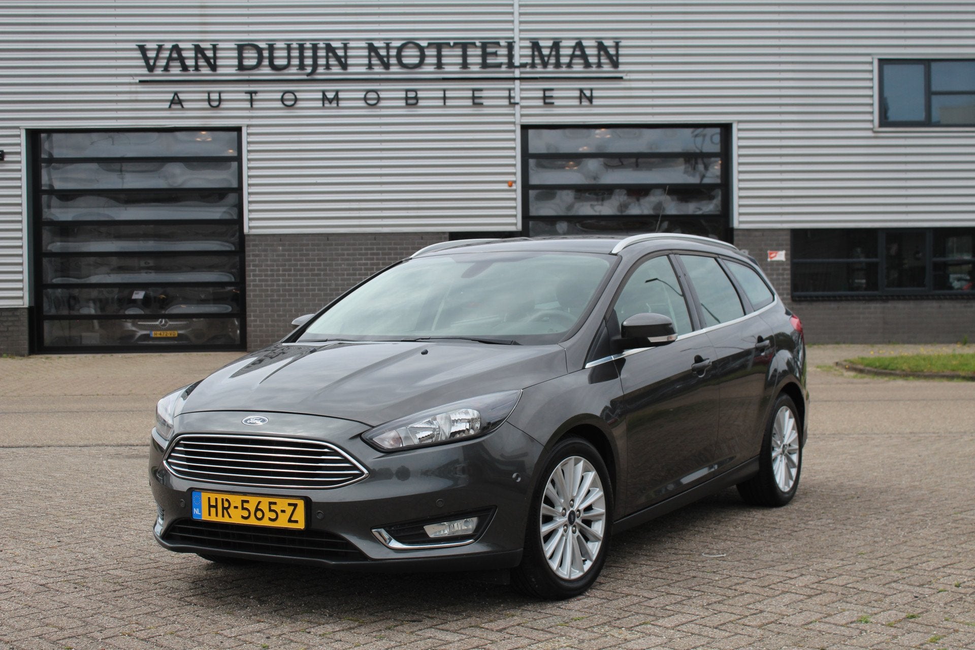 Ford FOCUS Wagon 1.0 Titanium Edition / Navigatie / Cruise /, Stof, Gebruikt, Met garantie (alle), Origineel Nederlands