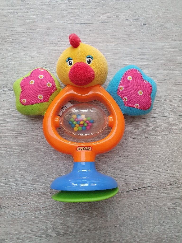 K's Kids Stick N Spin Emma zuignap Kip, Ophalen of Verzenden, Zo goed als nieuw, Rammelaar, Met geluid