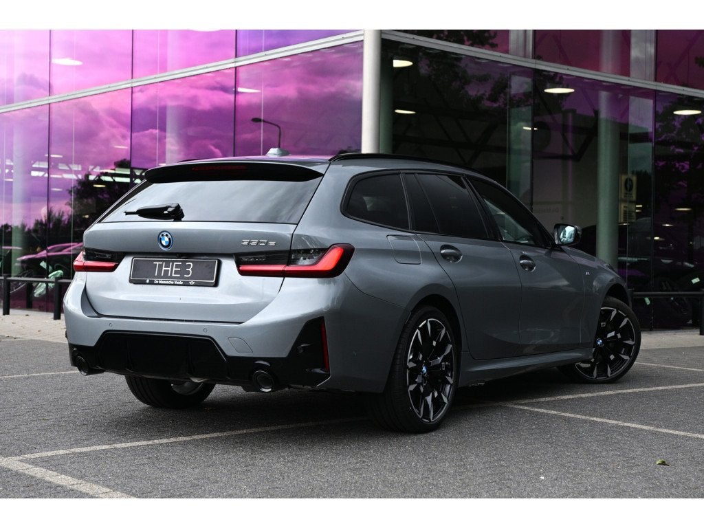 BMW 3 Serie Touring 330e M Sport Automaat / Panoramadak / Tr, Auto's, Achterwielaandrijving, 4 cilinders, Met garantie (alle)