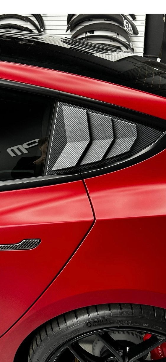 Tesla model 3 zijruit louvres, Ophalen