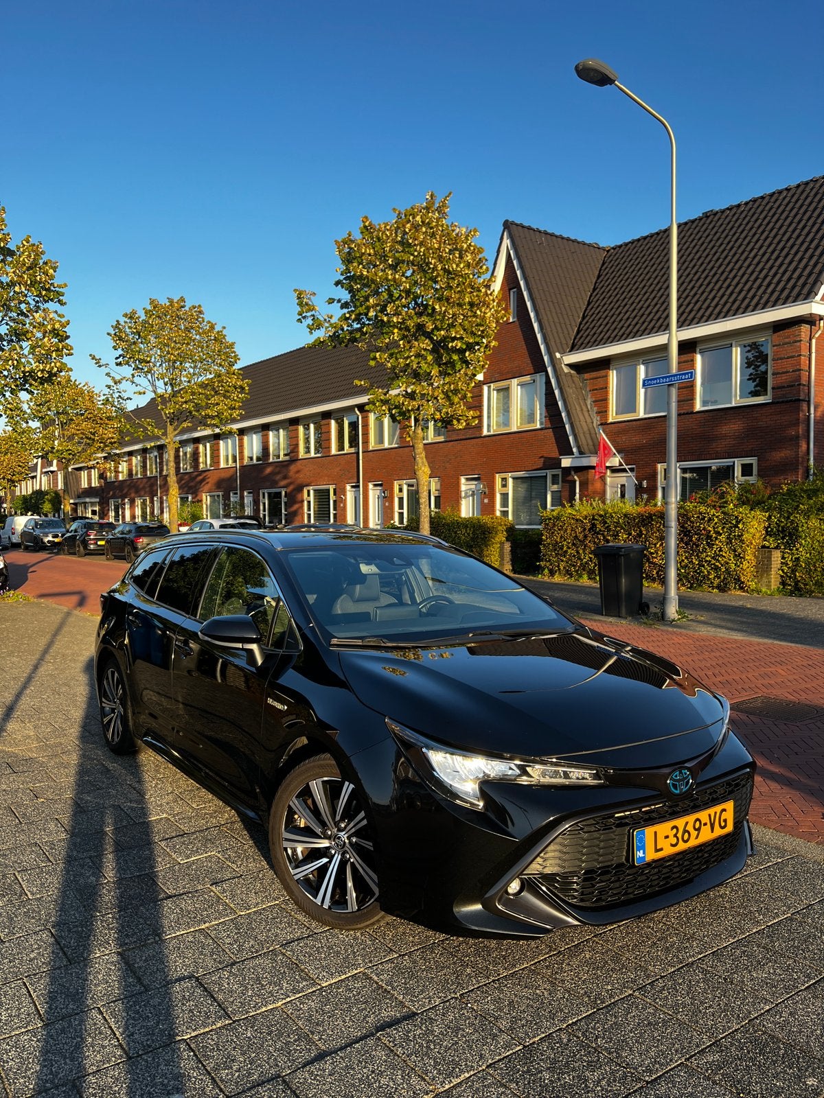 Toyota Corolla TS 1.8 Hybrid 122pk CVT 2021 Zwart, 1345 kg, 450 kg, 750 kg, Leder en Stof