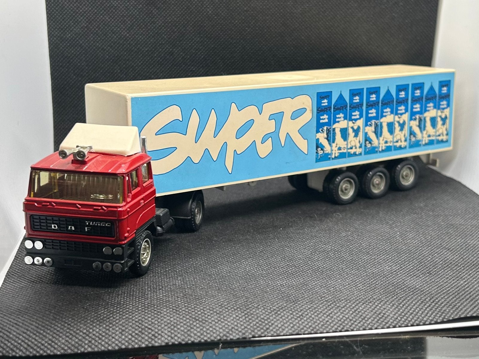 Solido DAF Super Melk, Verzenden, Zo goed als nieuw, Bus of Vrachtwagen