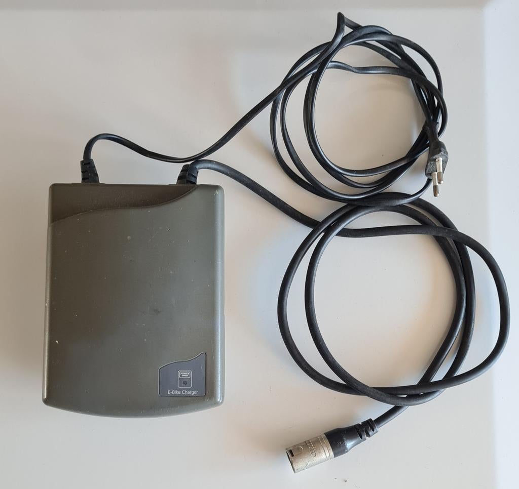 Exenius 3,4A e-bike acculader - 3 pins - ion, Fietsen en Brommers, Fietsaccessoires | Fietsaccu's, Ophalen of Verzenden, Gebruikt