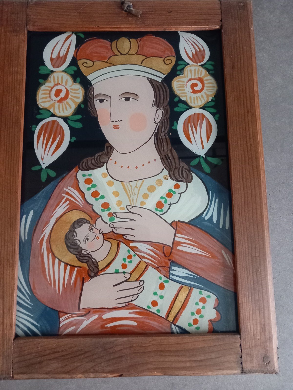 achterglasschilderij Maria met Jezus, Ophalen