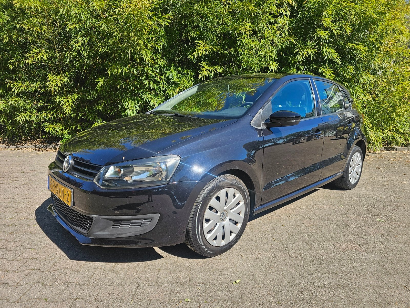 Volkswagen Polo 1.2 uit 2011 met trekhaak, Auto's, Voorwielaandrijving, 967 kg, 40 €/maand, 1198 cc