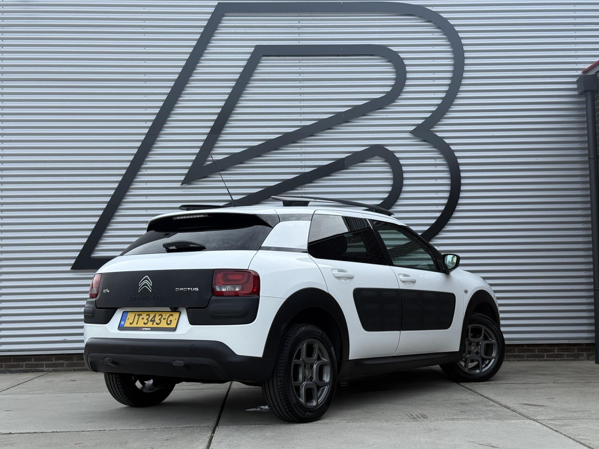 Citroen C4 Cactus 1.2 PureTech Shine 2e Eigenaar|Navi|Camera, Auto's, Voorwielaandrijving, Stof, Gebruikt, 1199 cc