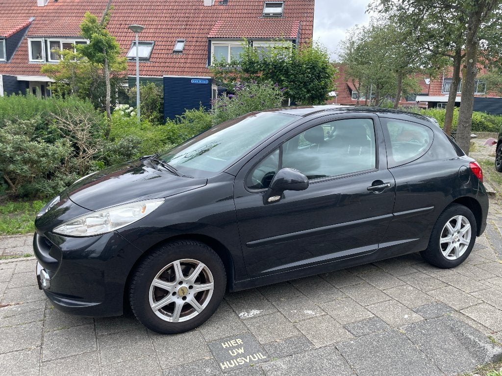 Peugeot 207 1.4 VTI 16V 3DRS 2009 Zwart, Auto's, Voorwielaandrijving, Stof, Origineel Nederlands, Handgeschakeld
