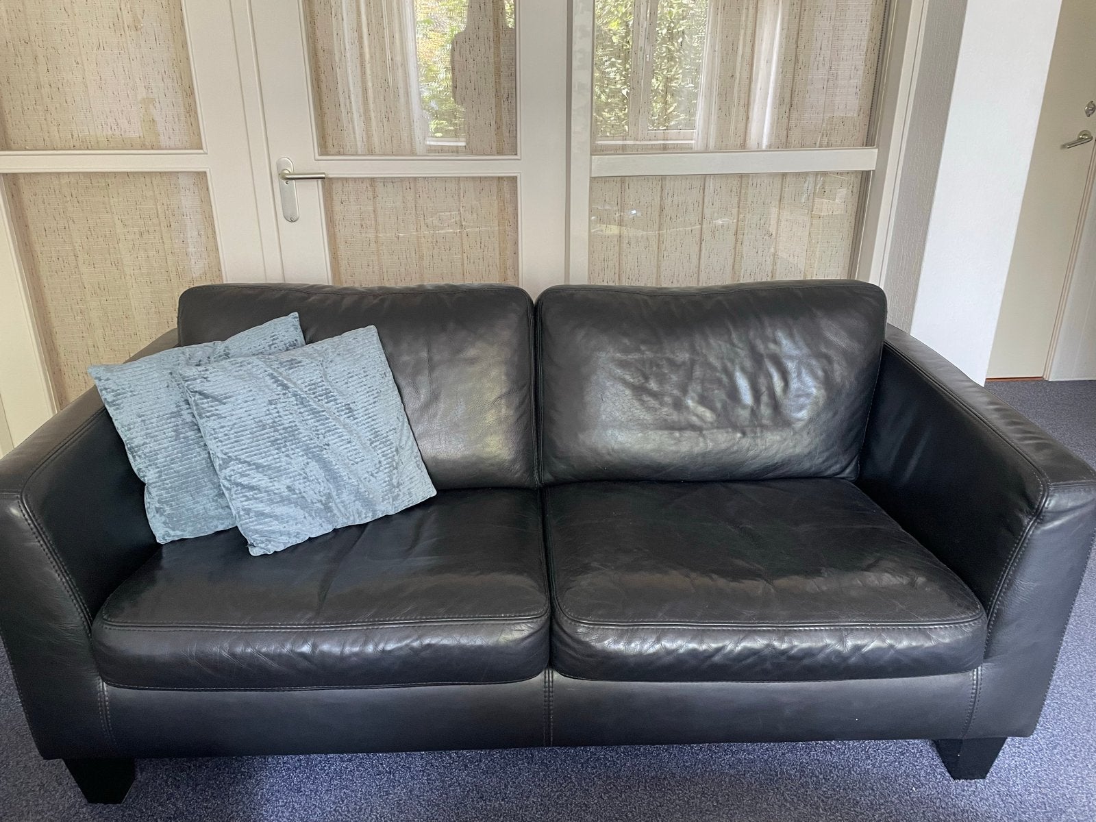 Zwarte leren tweezitsbank - 178 cm breed, Ophalen, Gebruikt, Minder dan 75 cm, 150 tot 200 cm