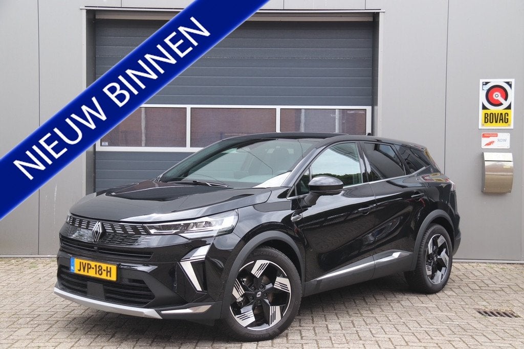Renault Symbioz 1.6 E-Tech full hybrid 145 iconic, Stoel & S, Auto's, Renault, 745 kg, Gebruikt, Leder en Stof, Zwart