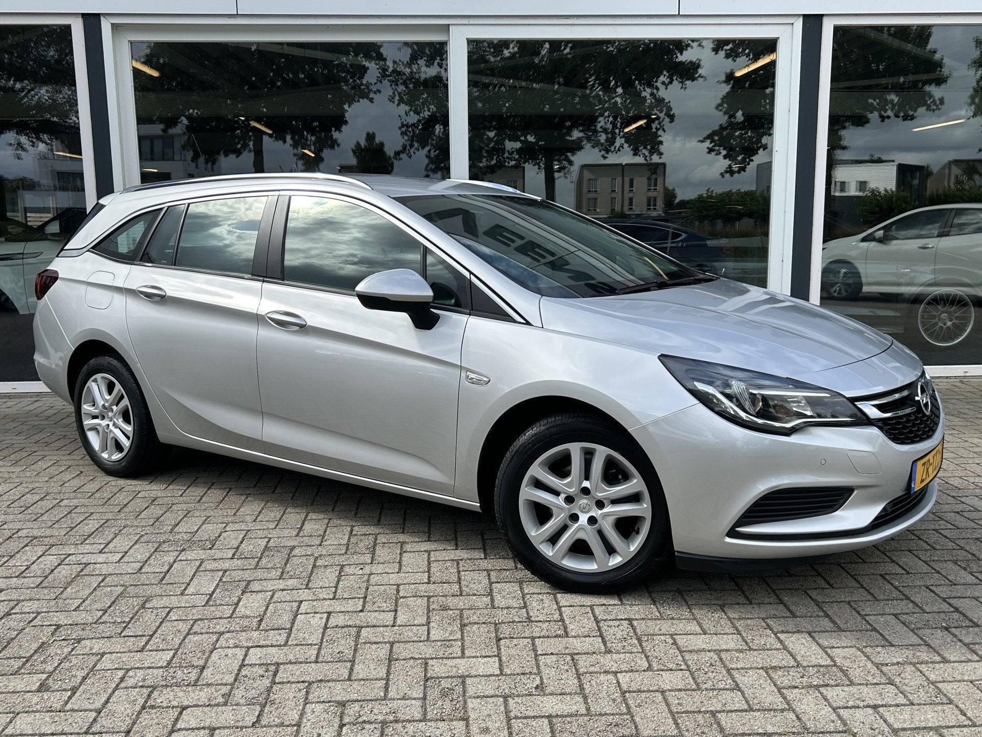 Opel Astra Sports Tourer 1.0 Turbo Business+ 50% deal 4.475,, Voorwielaandrijving, Gebruikt, Euro 6, 1178 kg