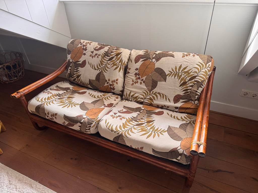 Vintage rotan bankje met tropische print kussens, Ophalen, Gebruikt, 150 tot 200 cm, Tweepersoons