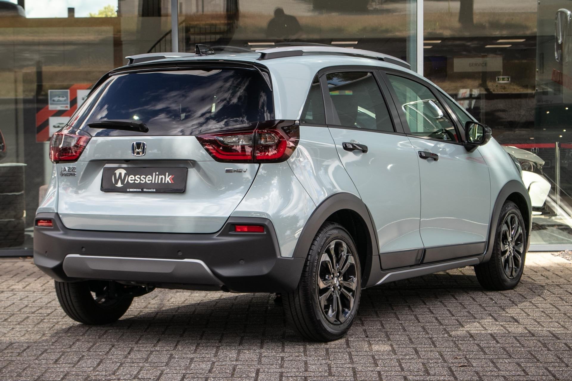 Honda Jazz 1.5 e:HEV Advance Crosstar -Navi | Apple Carpl/An, Auto's, 4 cilinders, Blauw, Leder en Stof, 122 pk