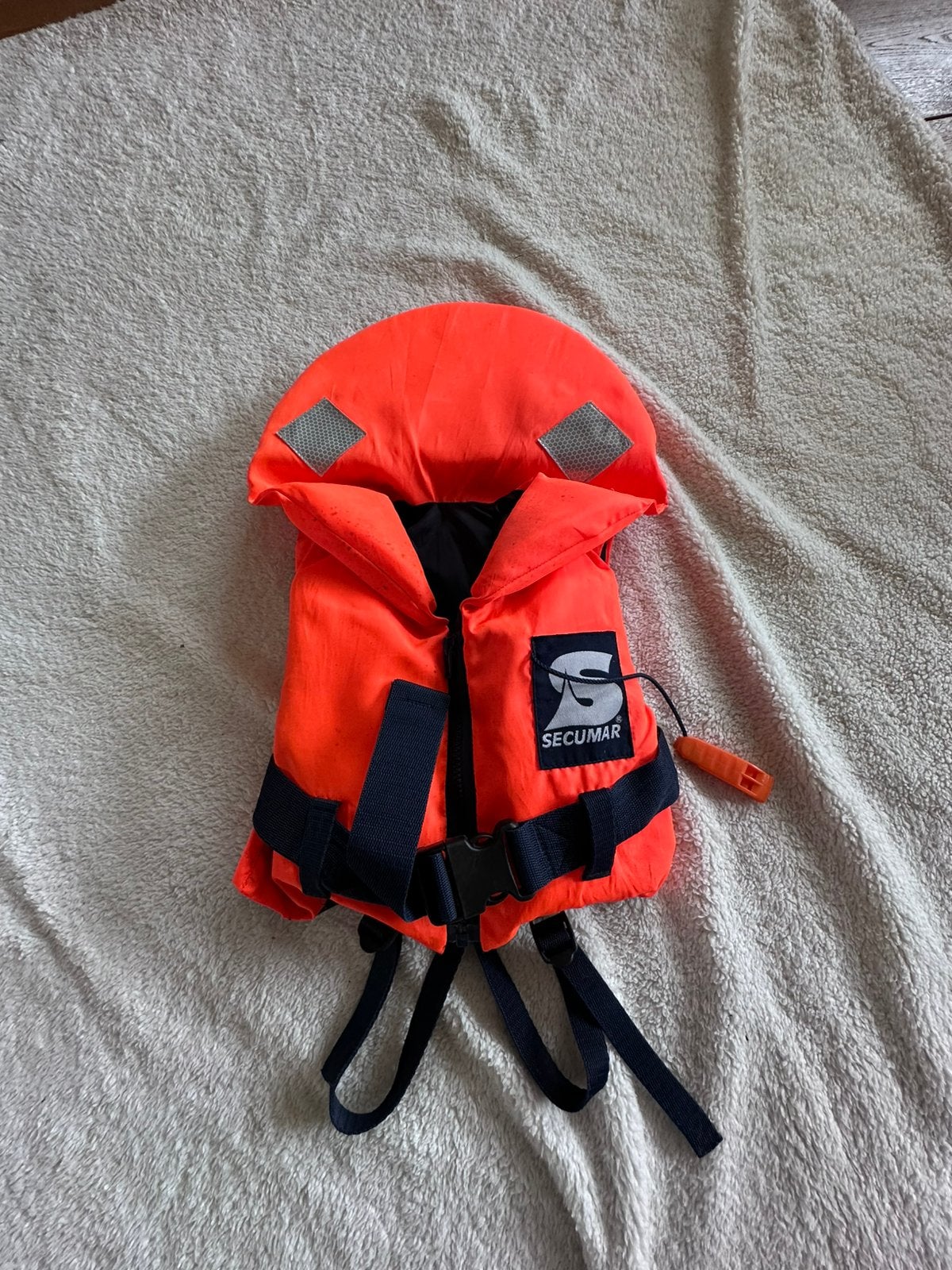 Reddingsvest van Secumar voor kind van 10-15kg, Watersport en Boten, Watersportkleding, Ophalen of Verzenden, Zo goed als nieuw