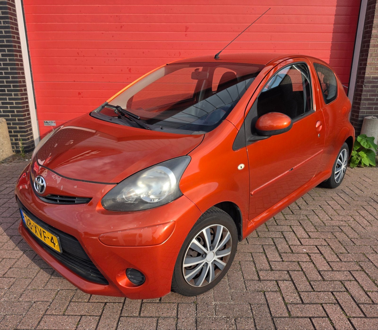 Toyota Aygo 1.0 12V Vvt-i 3DRS  oranje 2012 airco, Auto's, Voorwielaandrijving, Overige kleuren, 4 stoelen, Origineel Nederlands