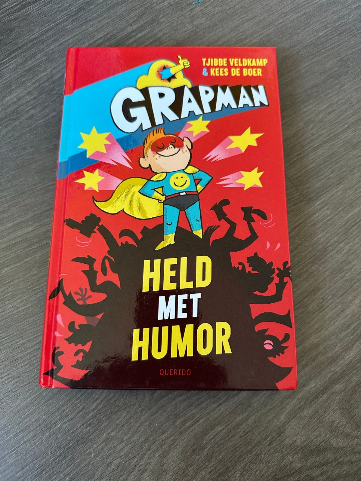 Grapman: Held met Humor - Tjibbe Veldkamp & Kees de Boer, Boeken, Ophalen of Verzenden, Zo goed als nieuw, Fictie algemeen