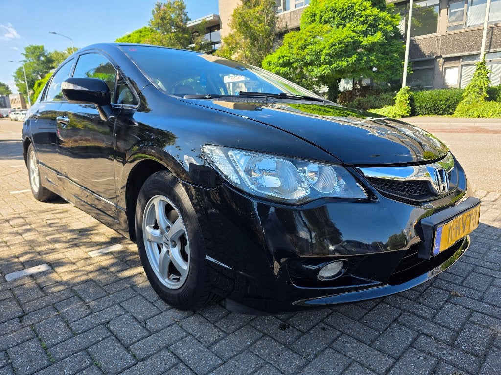 Honda Civic Hybrid 1.3 VTEC | Automaat | Leder | APK 07/2027, Auto's, Honda, Mistlampen, Beige, 4 cilinders, Zwart