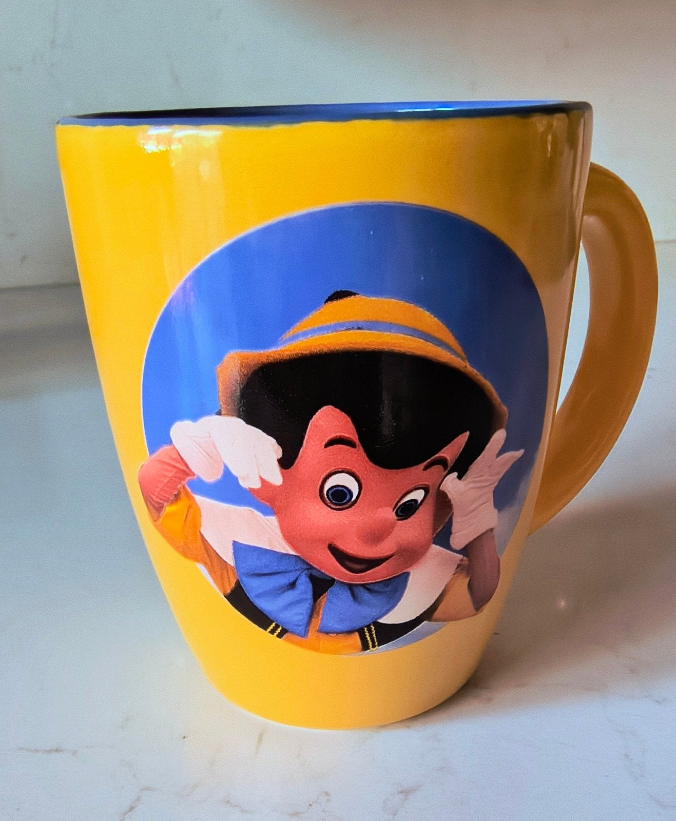 Disney Pinokkio Mok - Disneyland Parijs, Ophalen of Verzenden, Peter Pan of Pinokkio, Zo goed als nieuw, Servies